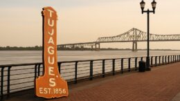 Tujague’s Iconic Sign Found Staring into Mississippi River, Whispering ‘What Now?’
