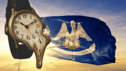 A melting clock draped over a strap floats in front of the Louisiana state flag at sunset, symbolizing the state’s distorted sense of time and progress.
