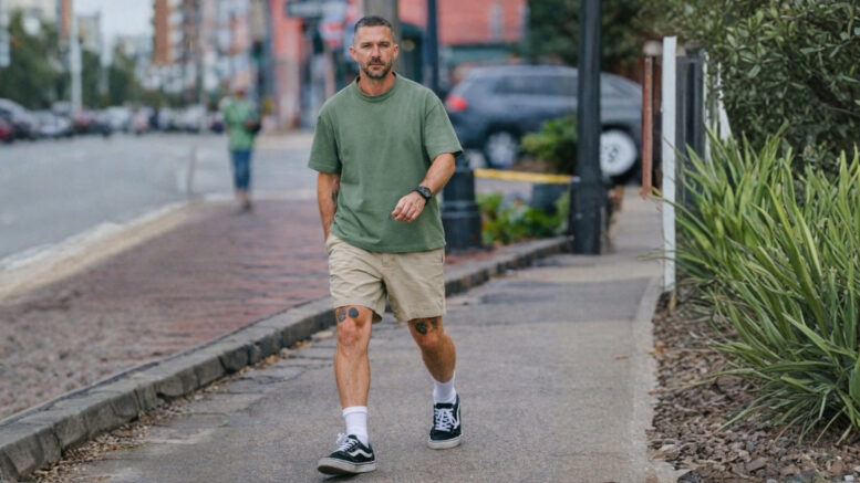Actor Shia LaBeouf walking along a New Orleans street in casual clothes.