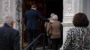 Local candidate greets parishioners outside New Orleans church ahead of upcoming election
