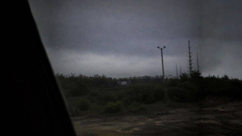 Grainy nighttime image allegedly showing a distant K&B sign near the abandoned Six Flags site in New Orleans East