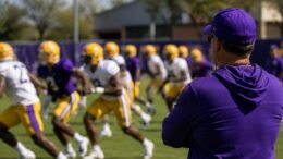 LSU football practice illustrating the Jayden Daniels No. 5 dispute and 5-star recruiting