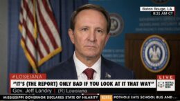 Gov. Jeff Landry speaks at a podium while addressing Louisiana's last-place ranking in the U.S. News Best States report.